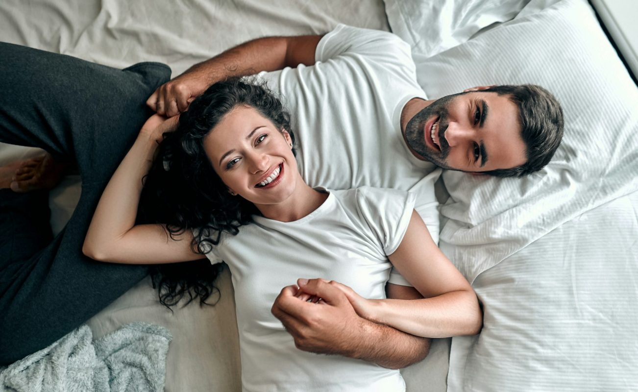 Young couple in bed